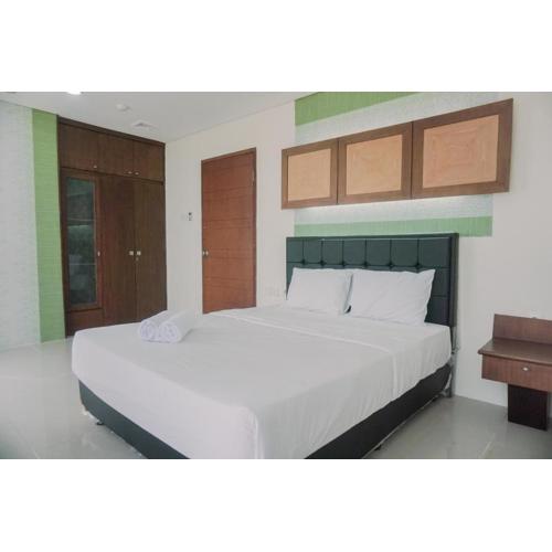 Spacious and Homey 2BR Mangga Dua Apartment By Travelio