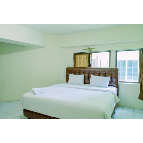 Spacious and Homey 3BR at Kondominium Rajawali Apartment By Travelio