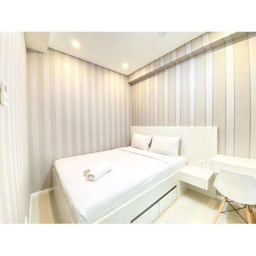 Spacious and Minimalist 2BR Apartment at Parahyangan Residence By Travelio