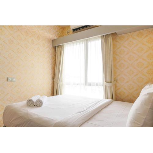 Spacious and Nice 1BR with Extra Room at Sky House BSD Apartment By Travelio