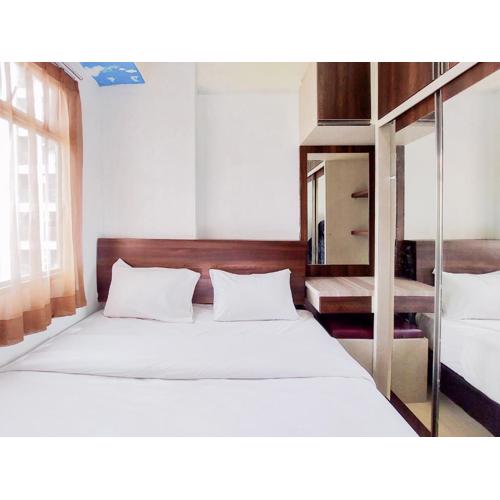 Spacious and Nice 2BR Serpong Greenview Apartment By Travelio