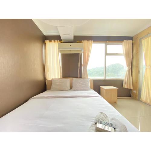 Spacious and Serene Studio Room Apartment at Jarrdin Cihampelas By Travelio