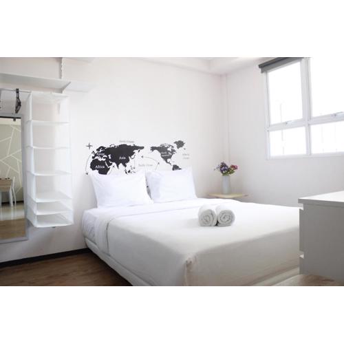 Spacious and Well Appointed 2BR @ Gateway Pasteur Apartment By Travelio