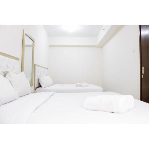 Spacious & Deluxe 2BR Gateway Ahmad Yani Cicadas Apartment By Travelio