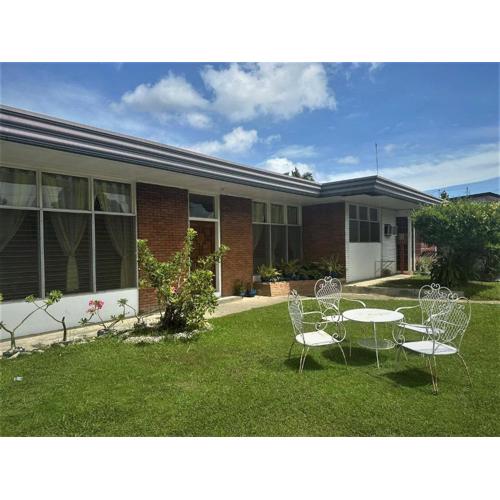 Spacious House with wide Parking Area and Lawn at Damosa Lanang