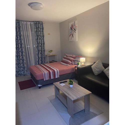 Spacious studio with balcony and guest parking