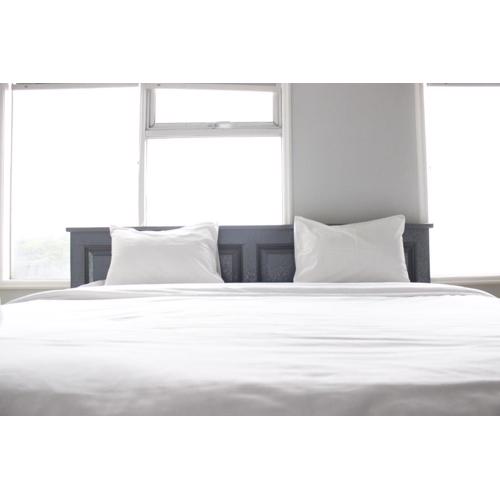 Spacious & Trendy Studio at Jarrdin Cihampelas Apartment By Travelio