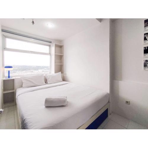 Spaicous 1BR with City View at Grand Asia Afrika Apartment By Travelio