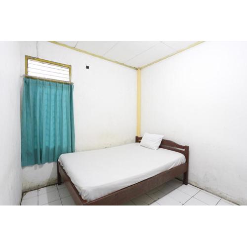 SPOT ON 92529 Penginapan Wisma Bintang Syariah Near MTs Al Ma'arif Kota Bangun