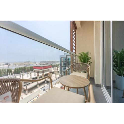 StayShort - Elegant 1-Bedroom Apartment in Jumeirah Village Triangle with Balcony Bliss
