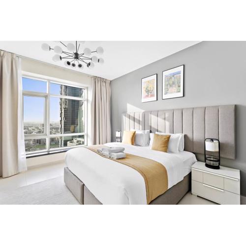 StoneTree - Stylish 1BR & Pool with Burj Khalifa Views