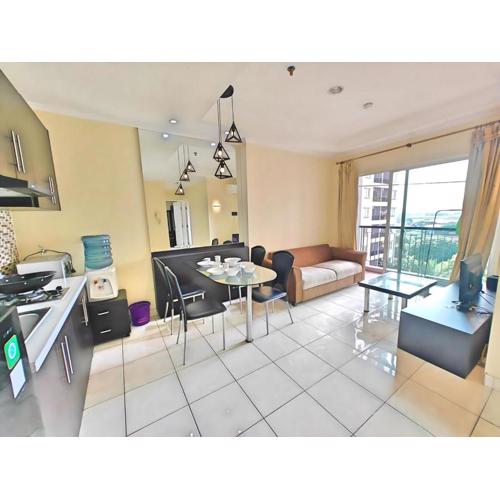 Strategic 2BR Gading MOI Apt with Wi-Fi, Pool & Gym by 2ndHome