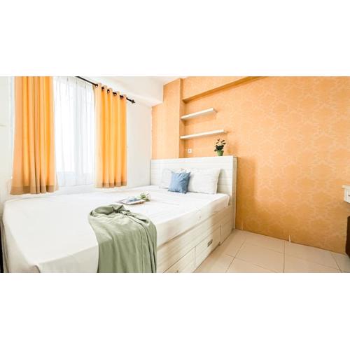 Strategic and Cozy 2BR Bassura City Apartment By Travelio