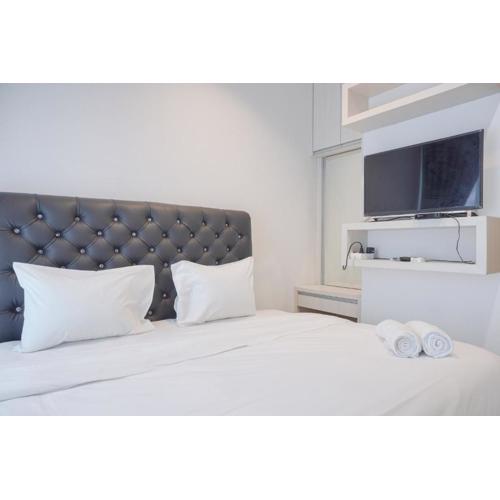 Strategic and Well Designed Studio Apartment at Capitol Park Residence By Travelio