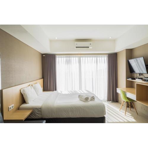 Strategic Studio Apartment at Tamansari La Grande near BIP By Travelio