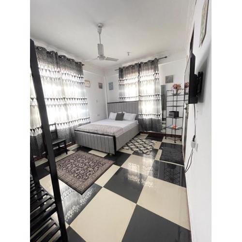 Studio apartment Mwenge