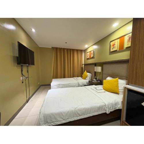 Studio deluxe cozy staycation Antel Spa Residences
