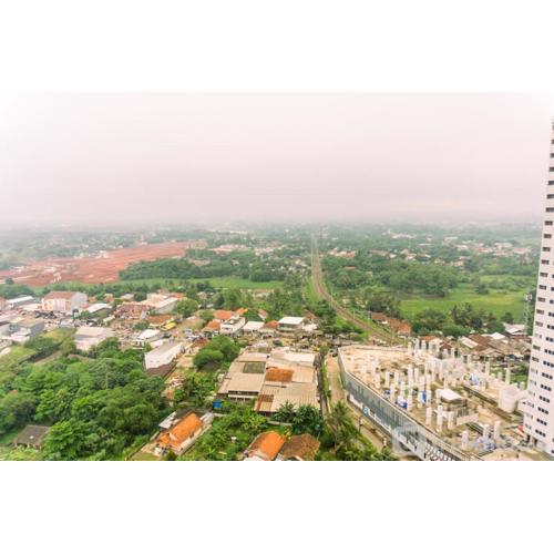 Studio Room with Cozy Style at Serpong Garden Apartment By Travelio