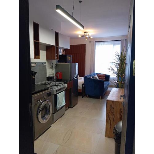 Studio with a Washing Machine