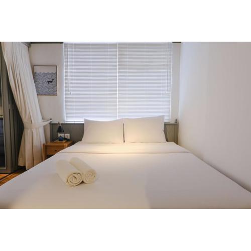 Studio with Private Living Room at Jarrdin Cihampelas Apartment By Travelio