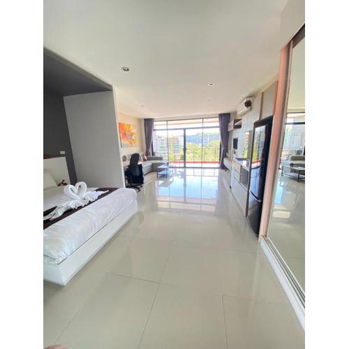 Stunning 60 sqm Studio at NaiHarn Beach Condo, Walk to Beach, Your Tropical Retreat!