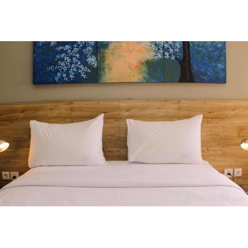 Stunning and Comfortable 1BR Apartment Mustika Golf Residence By Travelio