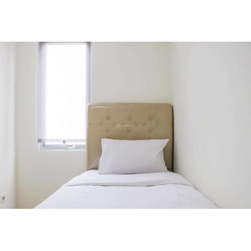 Stunning and Comfy 2BR Bassura City Apartment By Travelio