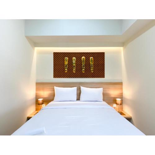 Stunning and Homey 2BR Apartment Mustika Golf Residence By Travelio