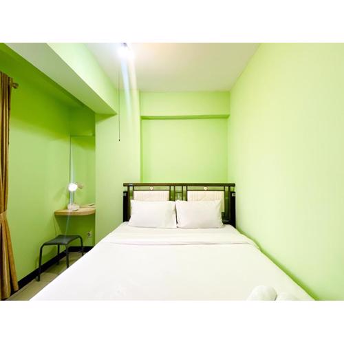 Stunning and Homey 2BR Pool View Green Bay Pluit Apartment By Travelio