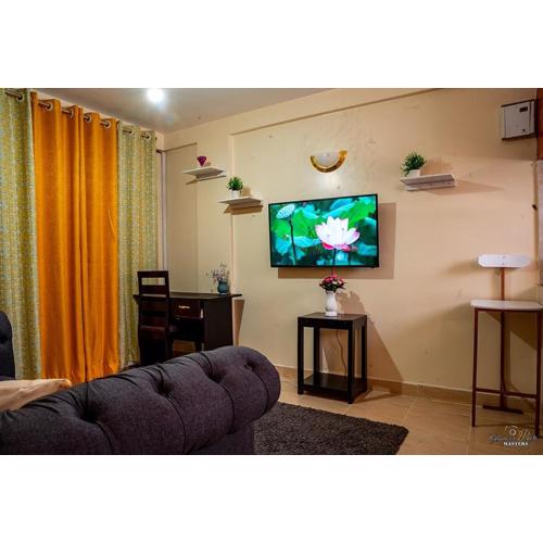 STYLISH 1BR APARTMENT IN KISUMU: FAST WI-FI, NETFLIX, SECURE PARKING