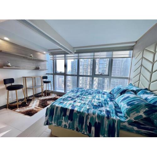 Stylish 1BR Uptown Parksuites BGC, 200mbps/SmartTv