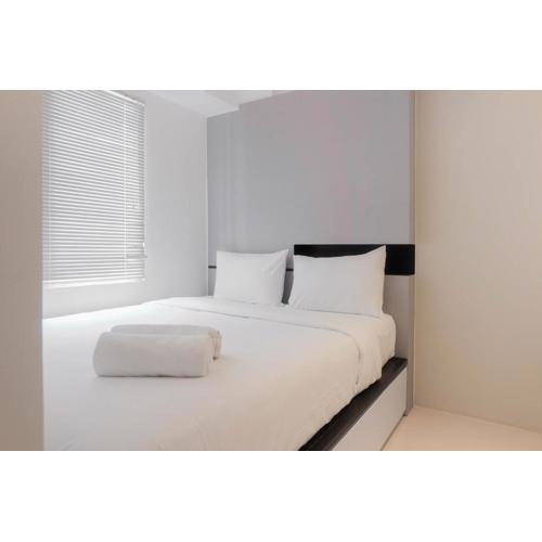 Stylish and Modern 2BR Bassura City Apartment By Travelio