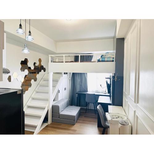 "Stylish Loft Condo with High-Speed WiFi at Avida Towers"