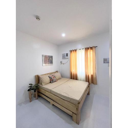 Sunnydale Apartelle -Room Accommodation near Calatagan Beach Resorts