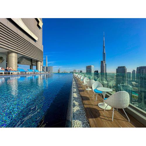 Super High Infinity Pool and amazing Burj Khalifa View 3 Bedroom apartment in Paramount Hotel Midtown
