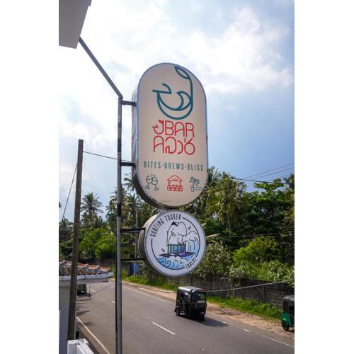 Surfing Tusker - Thalpe