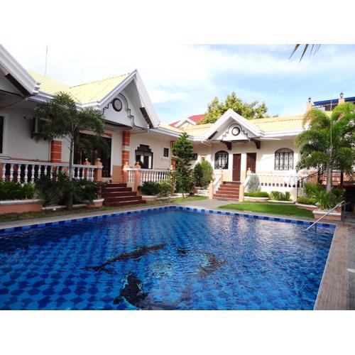 The Executive Villa Inn & Suites