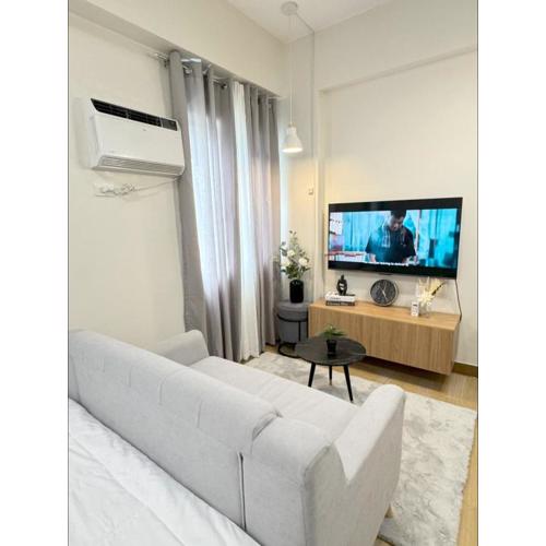 The Niall's Suites at HOPE Residences besides SM TRECE