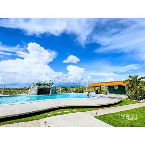 THE OASIS RESORT CondoBimbo 1-Big Room, Balcony, kitchen, Pool, Wifi, Videoke