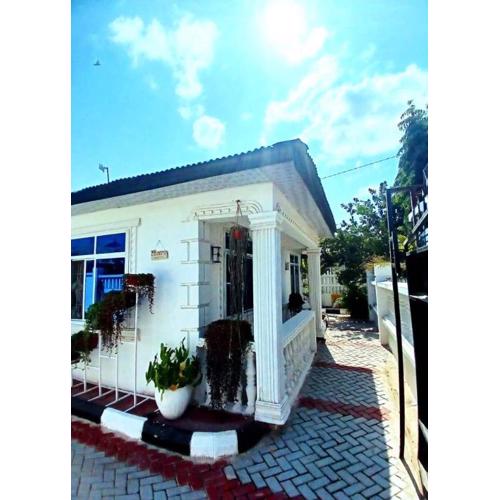 The white cottege Apartments