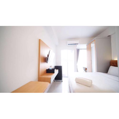 Tidy and Cozy Stay Studio Apartment at Suncity Residence By Travelio