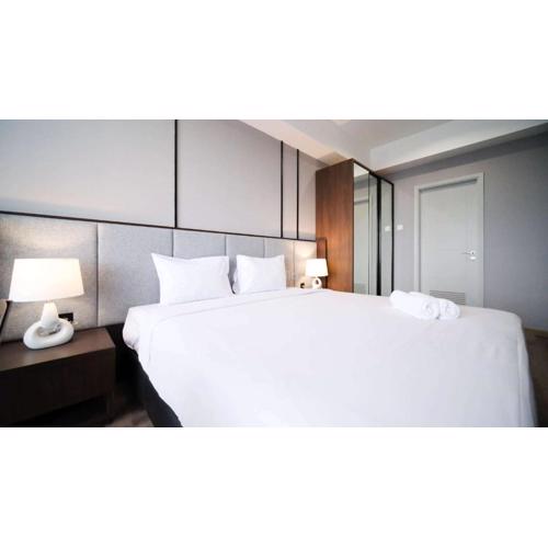 Tidy and Spacious 2BR at Grand Sungkono Lagoon Apartment By Travelio