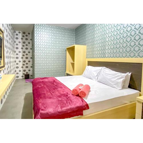 Tini's Guest House Malang Mitra RedDoorz