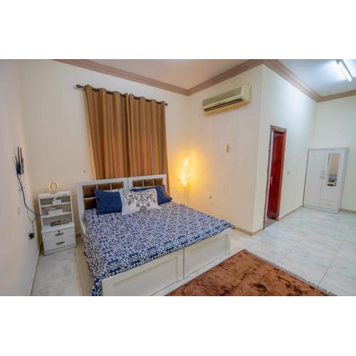 Tourist family and couple rooms abudhabi Baith Al Jannah LLC Private Family Rooms - Attached Washroom - VL01