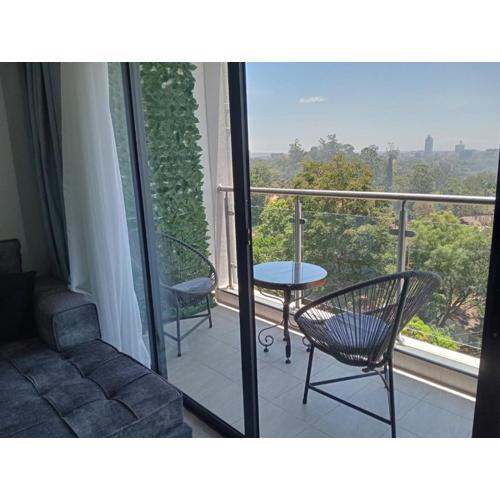 Tranquil 7th floor Apartment near Art Caffe Market