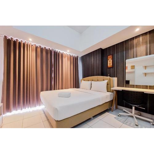 Tranquil and Homey Studio at Casa De Parco Apartment By Travelio