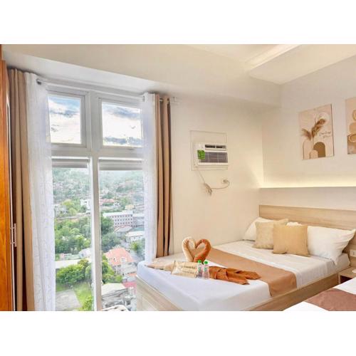 Tranquil Mountain View in Cebu City Studio unit for 1 to 4 pax with High speed WiFi Free Pool and Netflix