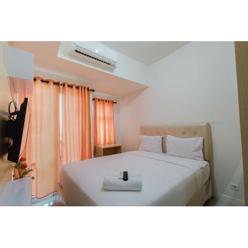 Tranquil Studio at Vida View Makassar Apartment By Travelio