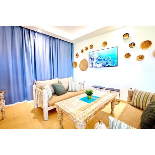 Tropical Boho beachront retreat with views & pool