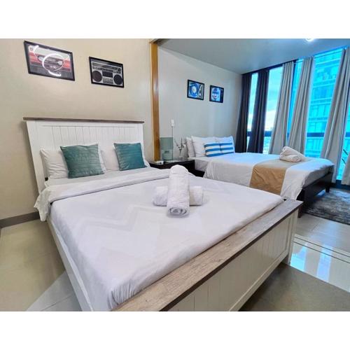 Uptown Mall Linked 1BR 2 Beds Best Value BGC